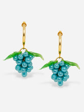 Load image into Gallery viewer,  Handmade grape earrings with sterling silver hoops and iridiscent blue beads.