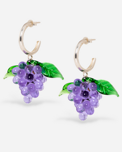 Grape earrings made of sterling silver hoops and lilac glasss beads.