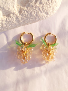 Gold Hoop earrings with glass grape charm in champaign colour.