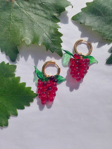 Cute gold plated hoop earrings with a red handmade glass grape charm. The perfect gift for the colorful food  jewelry lovers.