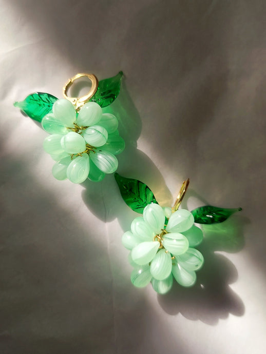 Mint green berry earrings with gold plated sterling silver hoops and glass beads.